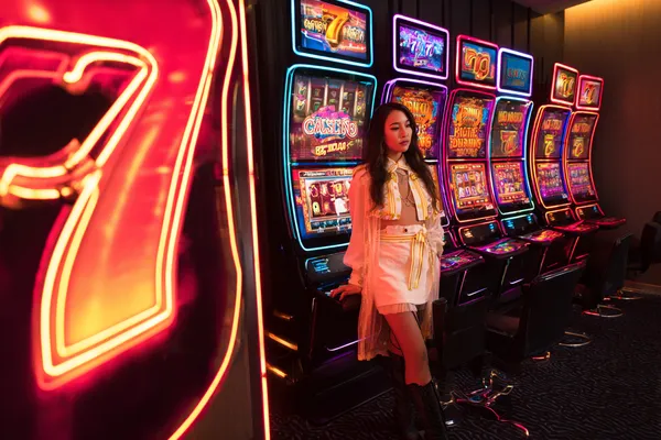 A confident dealer surrounded by casino chips inviting players to access their CU888 account, reflecting quick and easy login options.